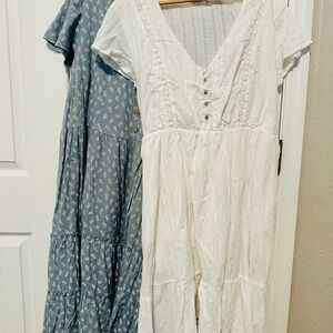 Two summer dresses: White and Blue Floral dress , and a white Dress